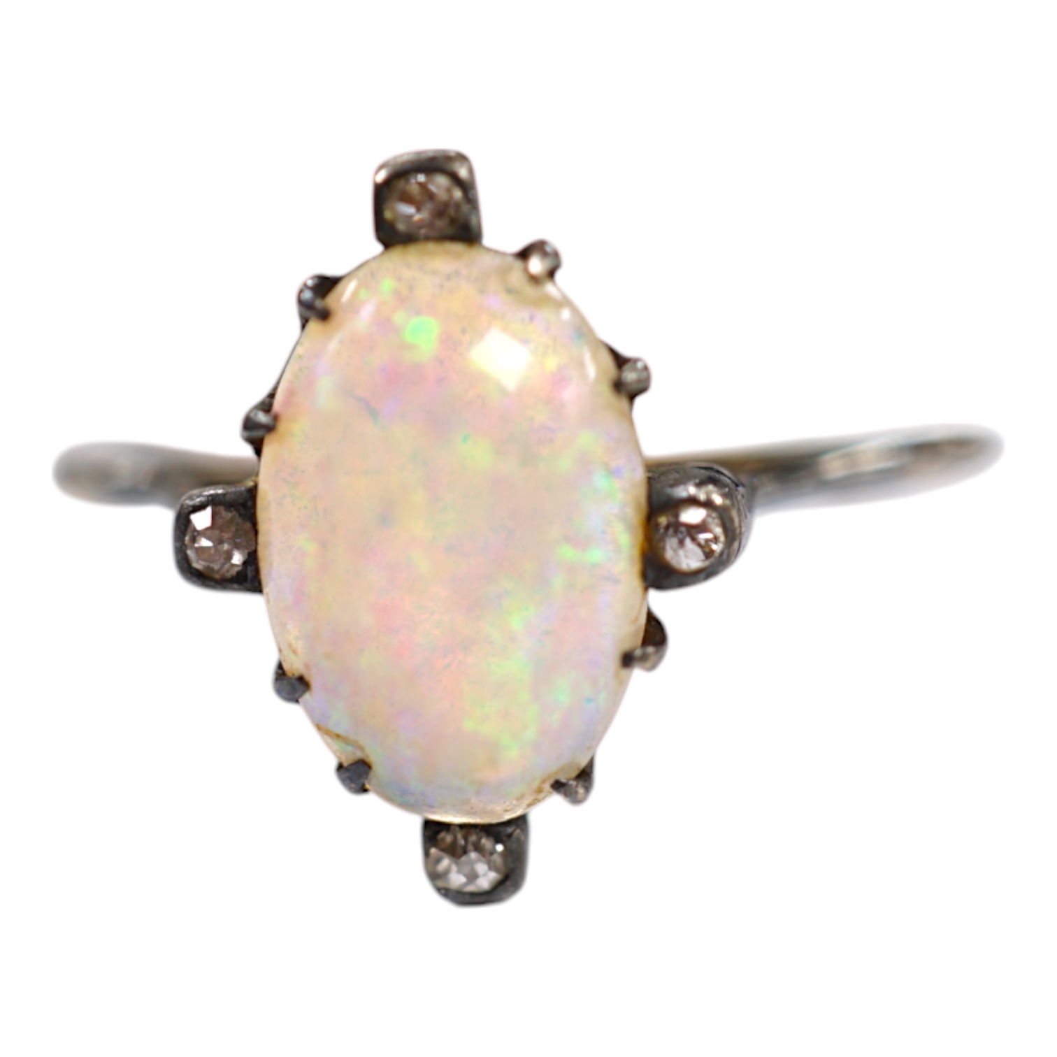 An antique, yellow and white metal, white opal and diamond set ring, size T, gross weight 2.1 grams. Condition - poor to fair